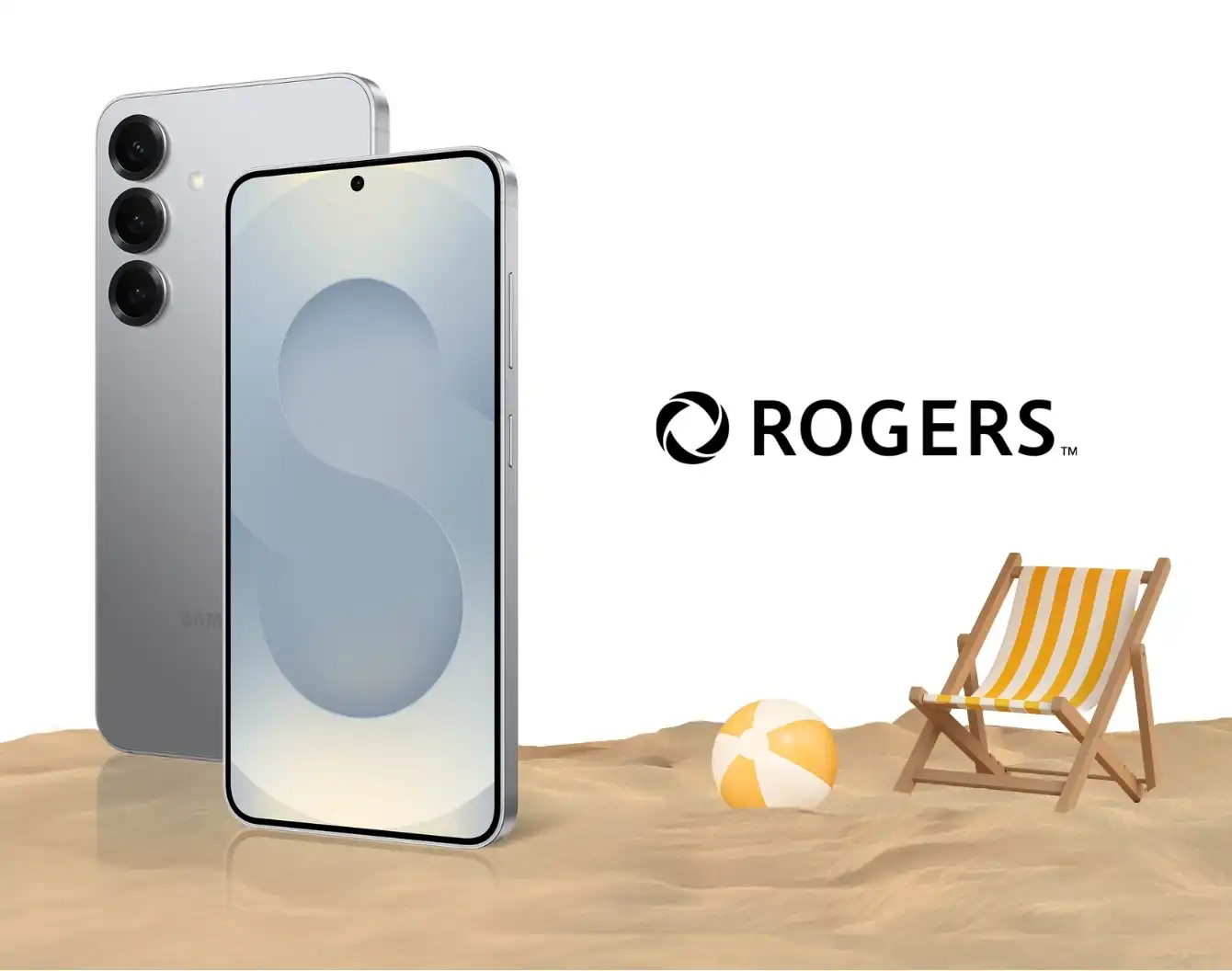 A silver Galaxy S25 rests on the sand of a beach with a blue sky above.